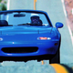 A Miata driver who’s partially wisened up to the slow march of UV rays, time and woe. Photo credit: Mazda